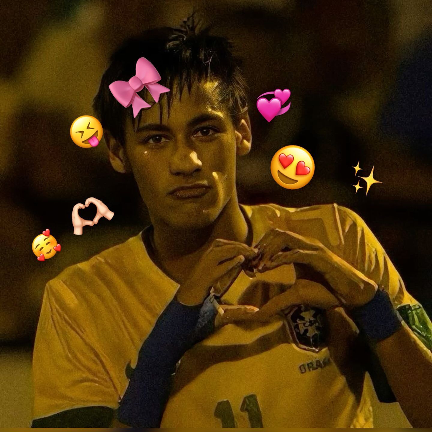 Foto de Neymar fazendo coração com emojis coloridos